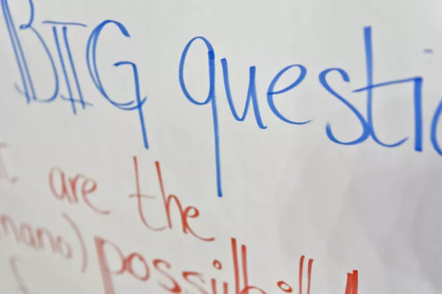 Picture of a whiteboard with text big question