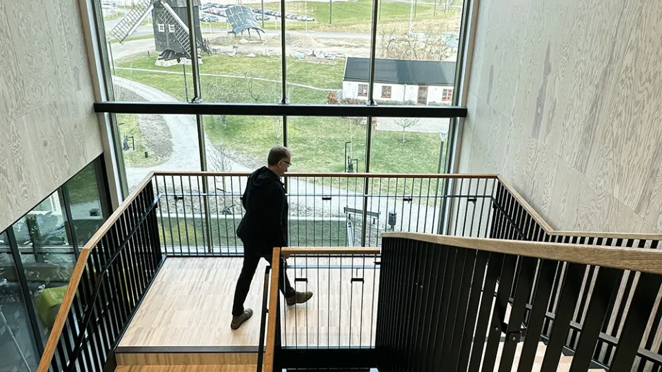 A man walking up stairs.