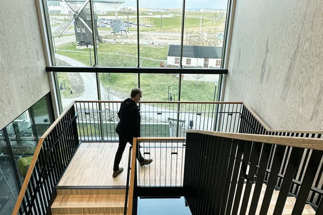 A man walking up stairs.