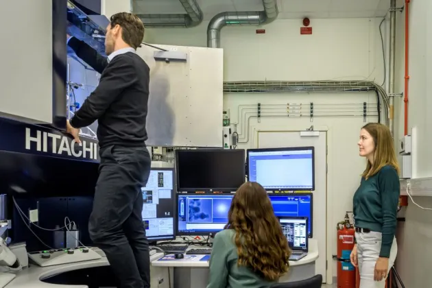 Photo of people conducting scientific experiments.