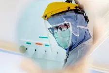 Photo of a person in the cleanroom laboratory.