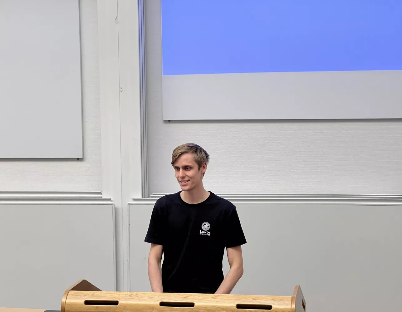 Photo of a man presenting.